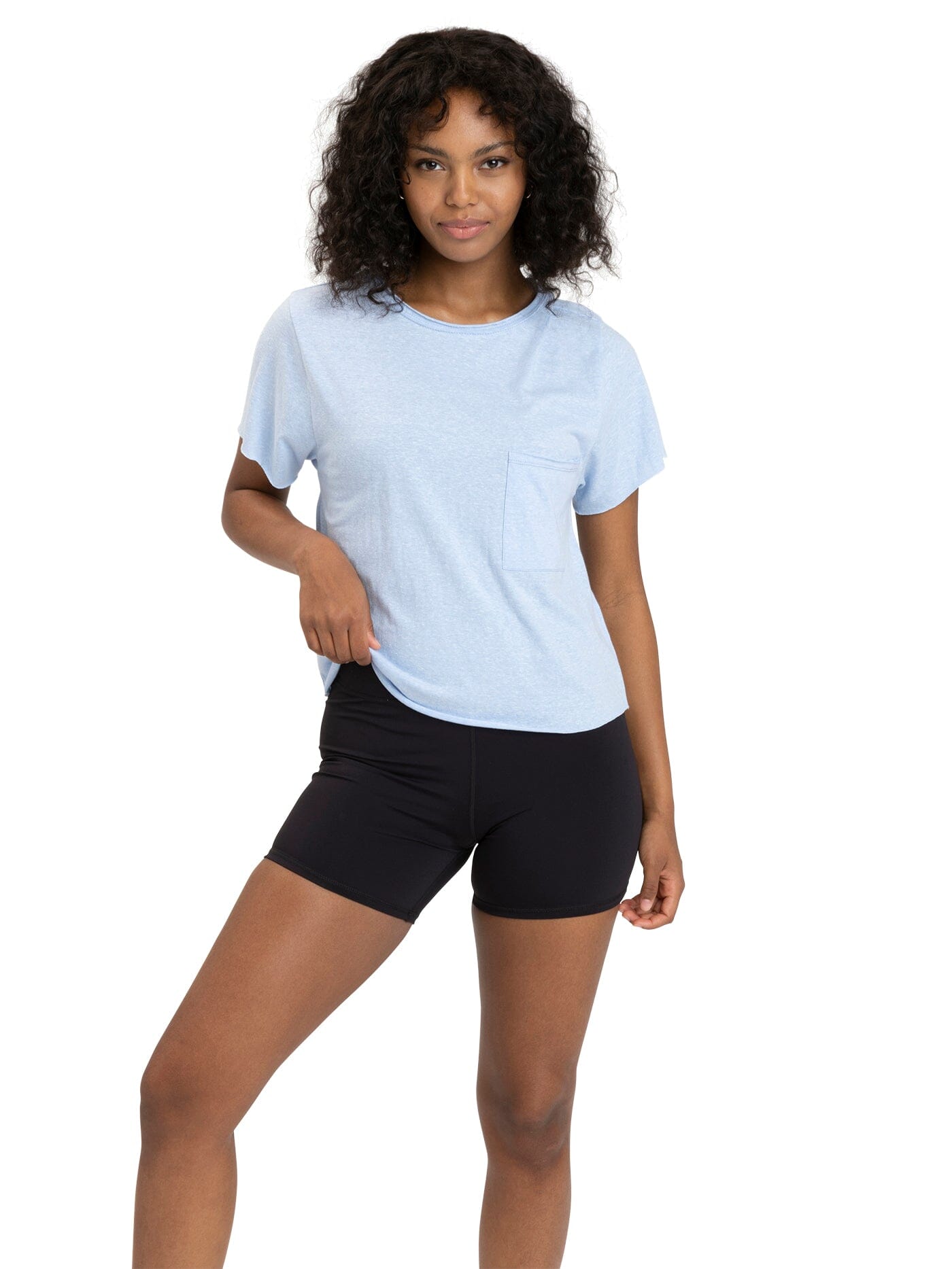 Woman wearing a high-waisted Maggie Triblend Tee in organic cotton and modal