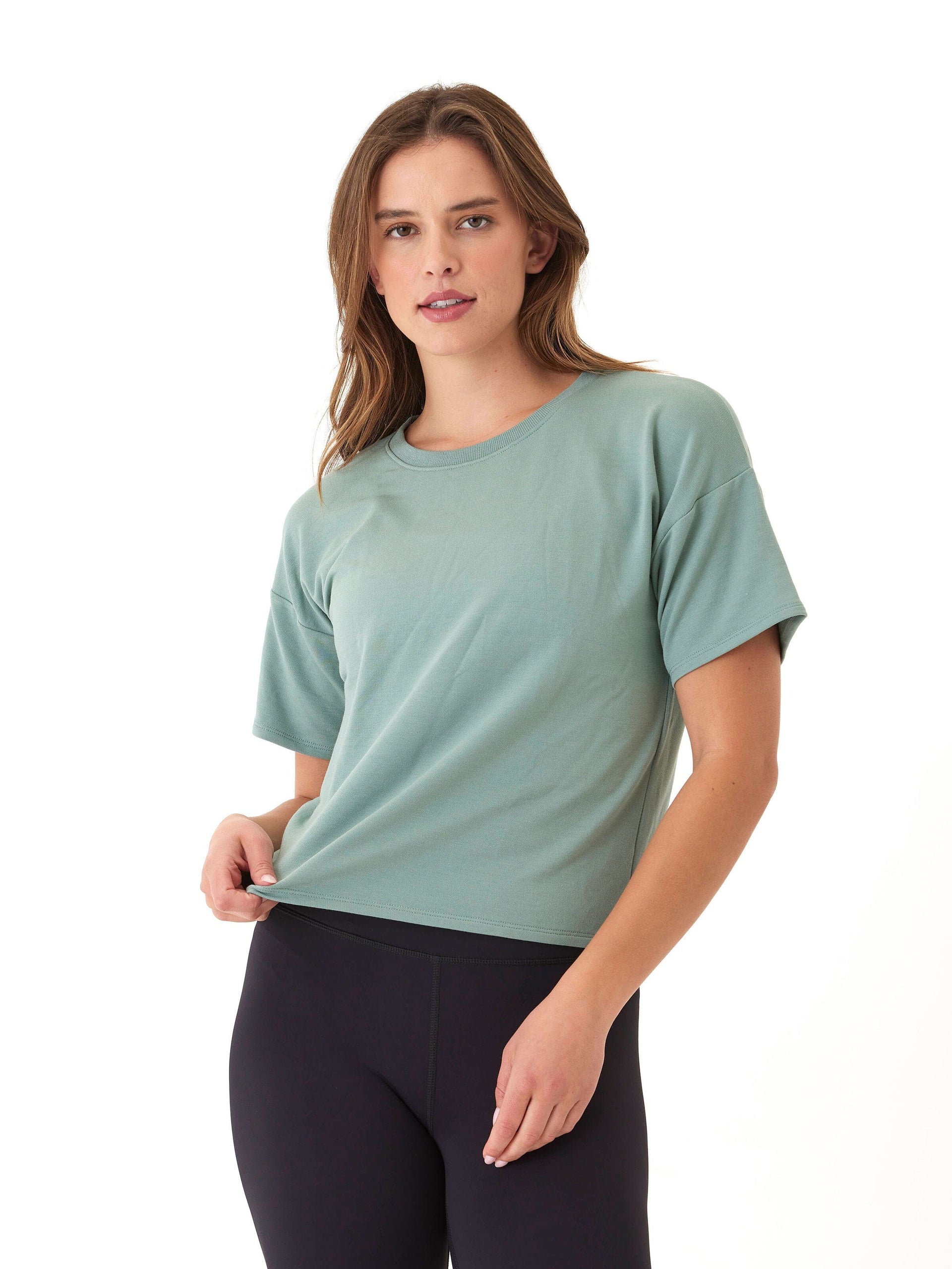 Model wearing a comfortable relaxed fit Core Modal Terry Crew Neck Tee in a soft, lightweight fabric