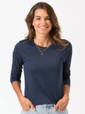 Women wearing a relaxed fit navy blue long sleeve scoop neck tee