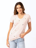 Close up of a blush pink v-neck tee with small cactus embroidery