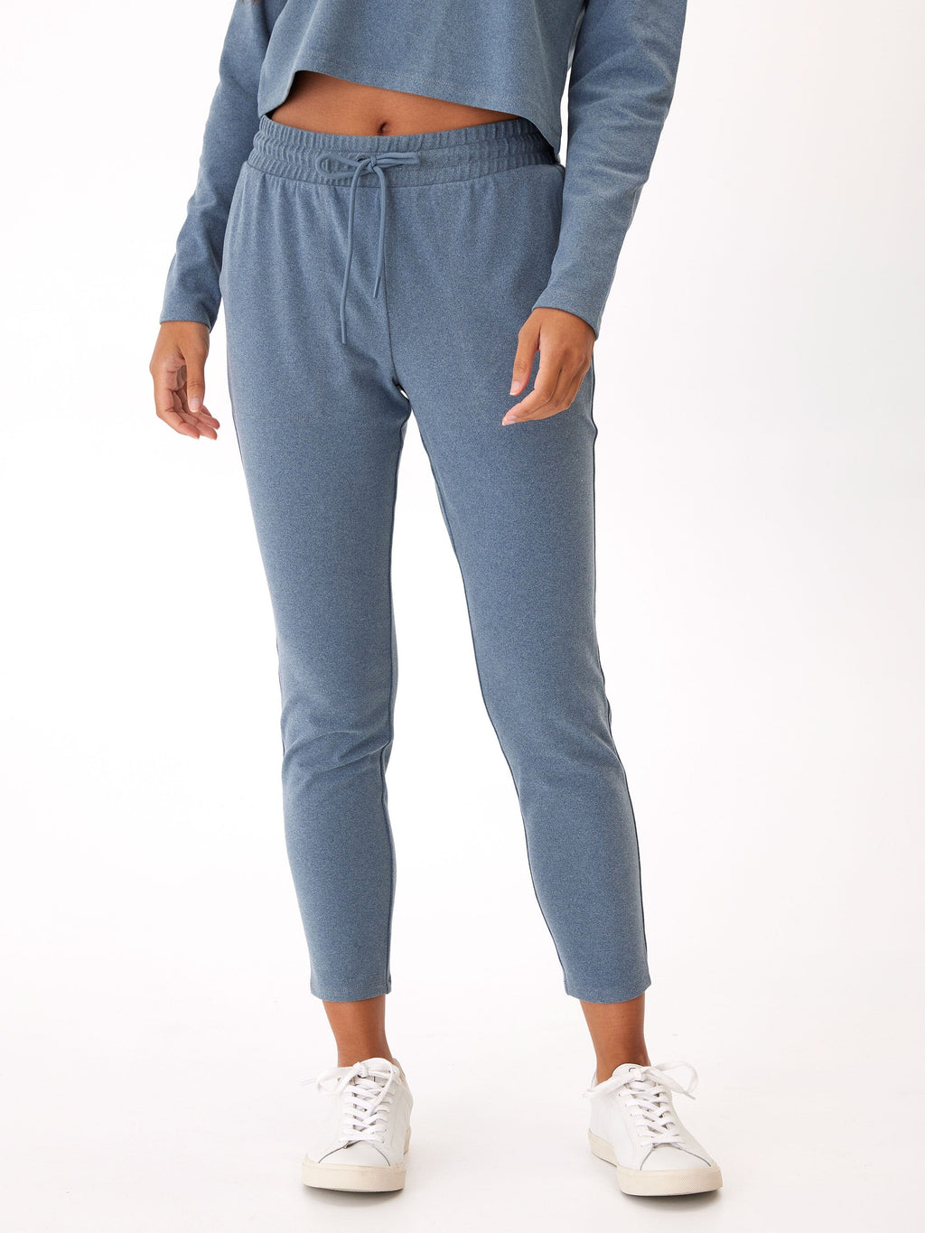 Women wearing Lacey Luxe Fleece Joggers in muted heathered slate blue with a tapered fit.