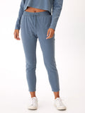 Women wearing Lacey Luxe Fleece Joggers in muted heathered slate blue with a tapered fit.