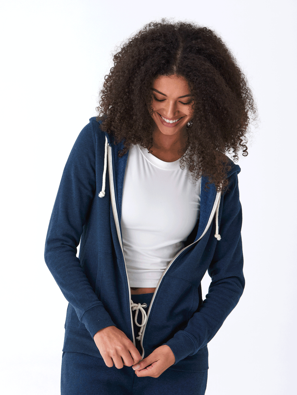 Unisex Core Triblend Fleece Zip Hoodie in navy blue and white, featuring a knit texture and front zipper.