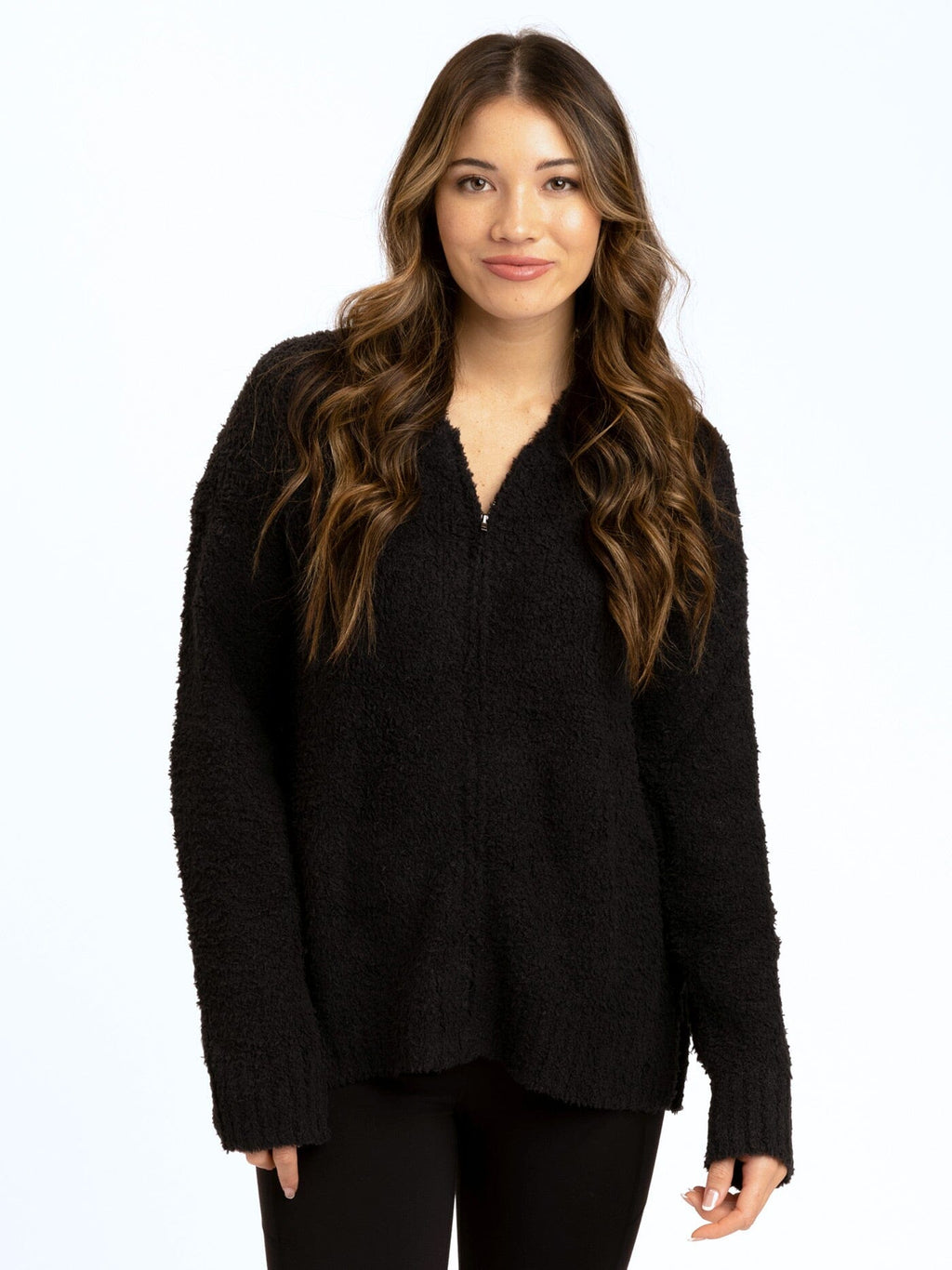 Close up of black Anita boucle sweater knit zip-up hoodie.