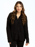 Close up of black Anita boucle sweater knit zip-up hoodie.