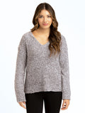 Woman wearing grey Aberdeen V-neck boucle sweater knit pullover.