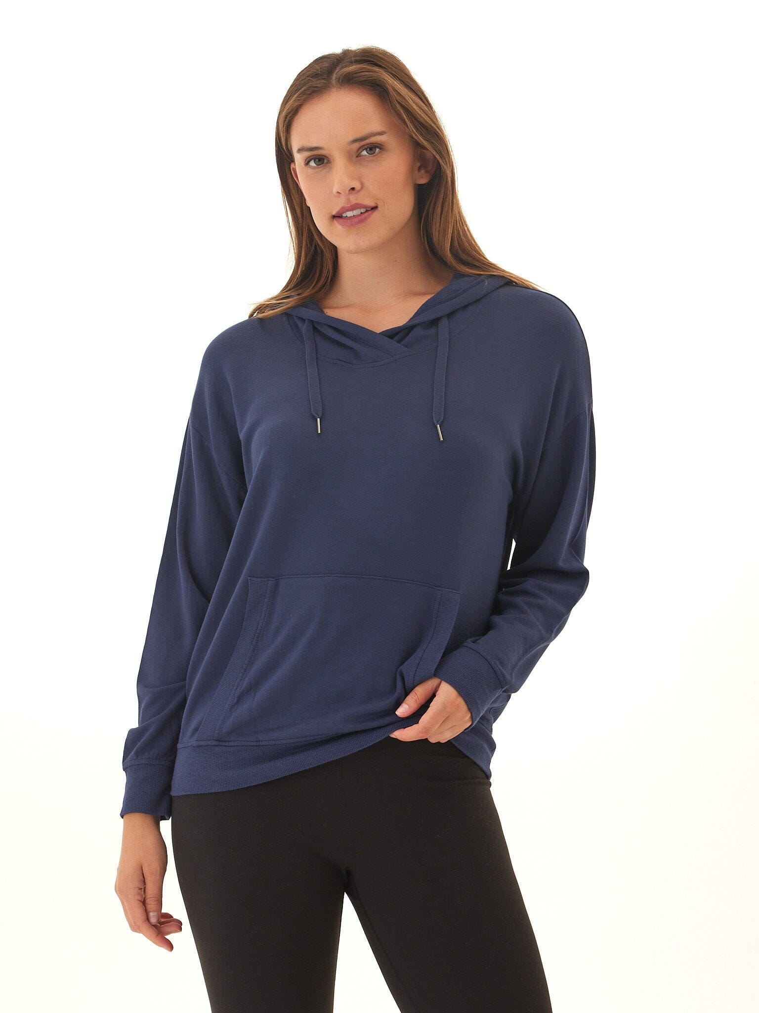 Women's relaxed fit navy blue pullover hoodie made of soft FeatherLoop fleece with front pockets.