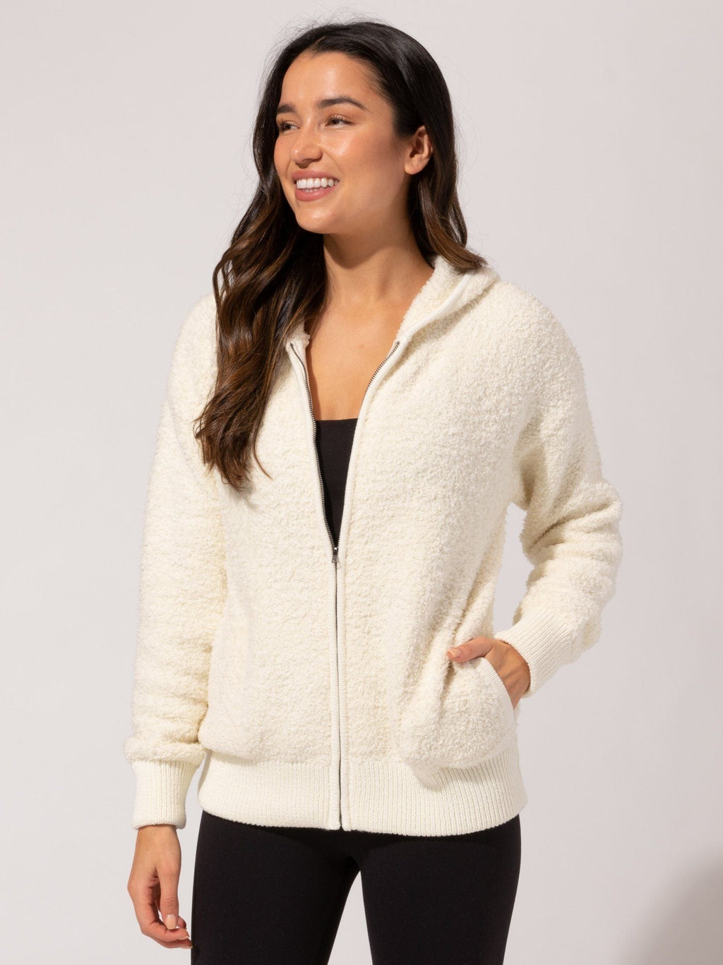 Vivi Boucle Zip Hoodie in off-white featuring a front zipper and ribbed cuffs