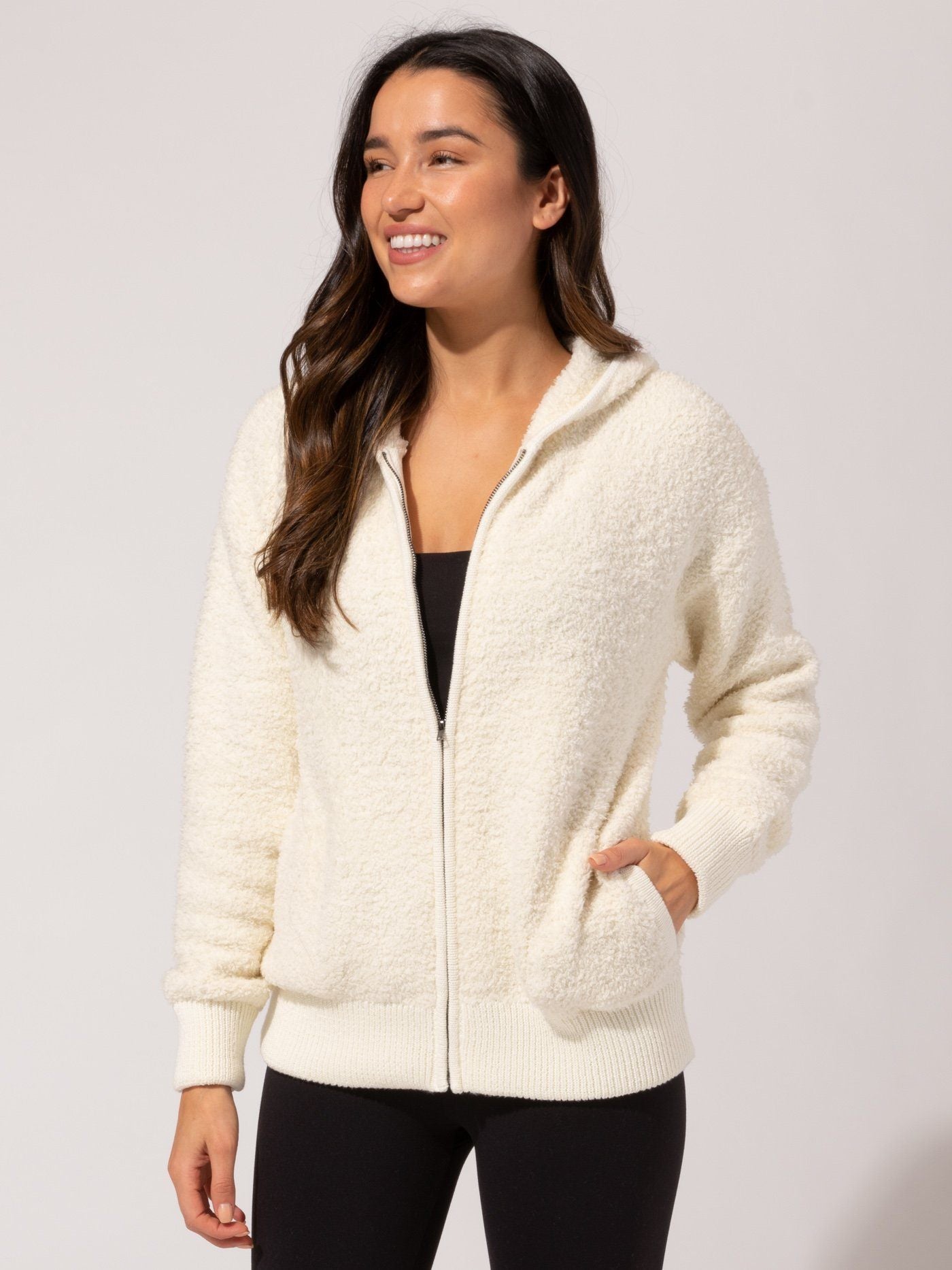 Vivi Boucle Zip Hoodie in off-white featuring a front zipper and ribbed cuffs