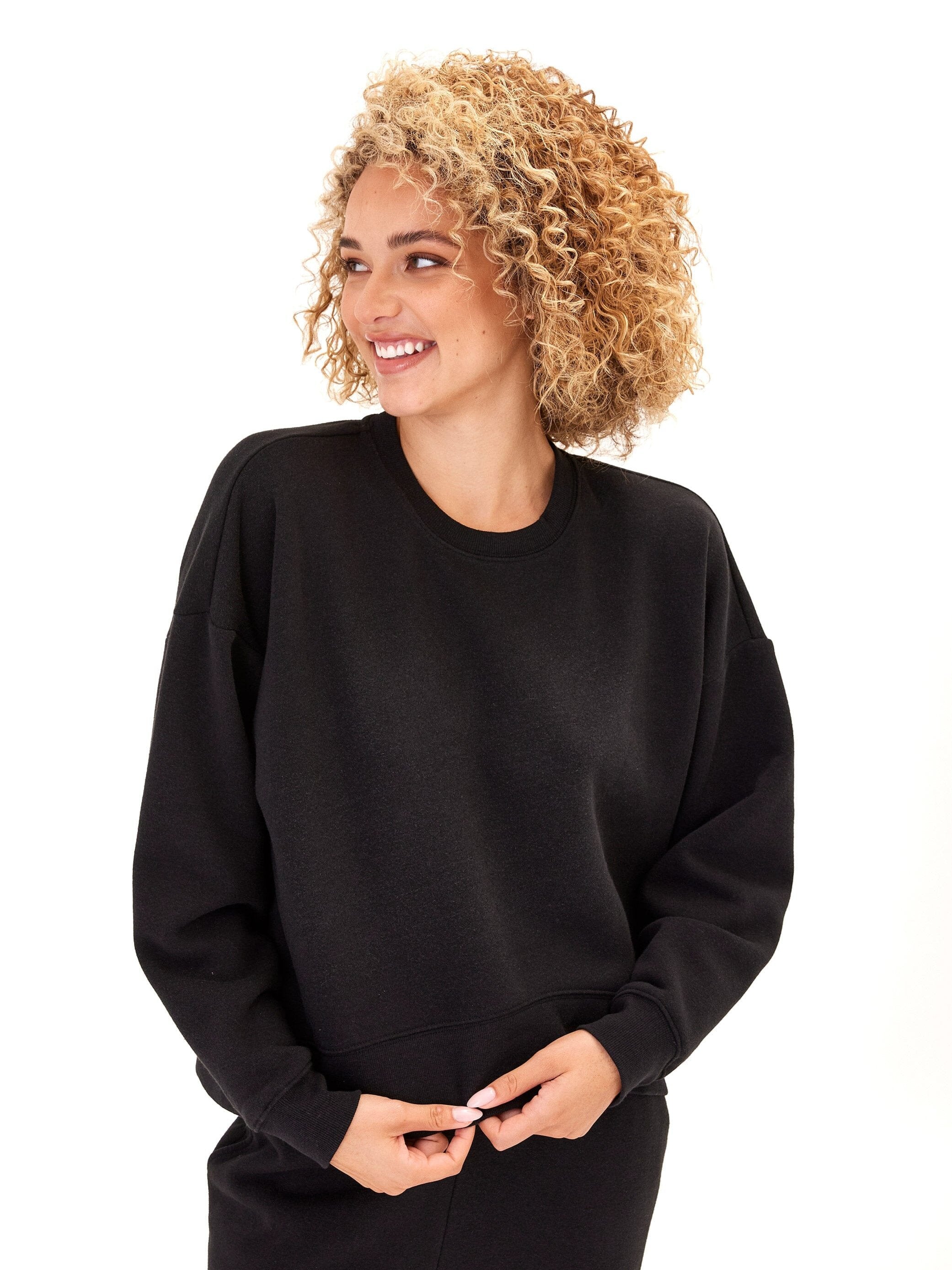 A soft triblend fleece crop pullover with rib trim in an oversized fit
