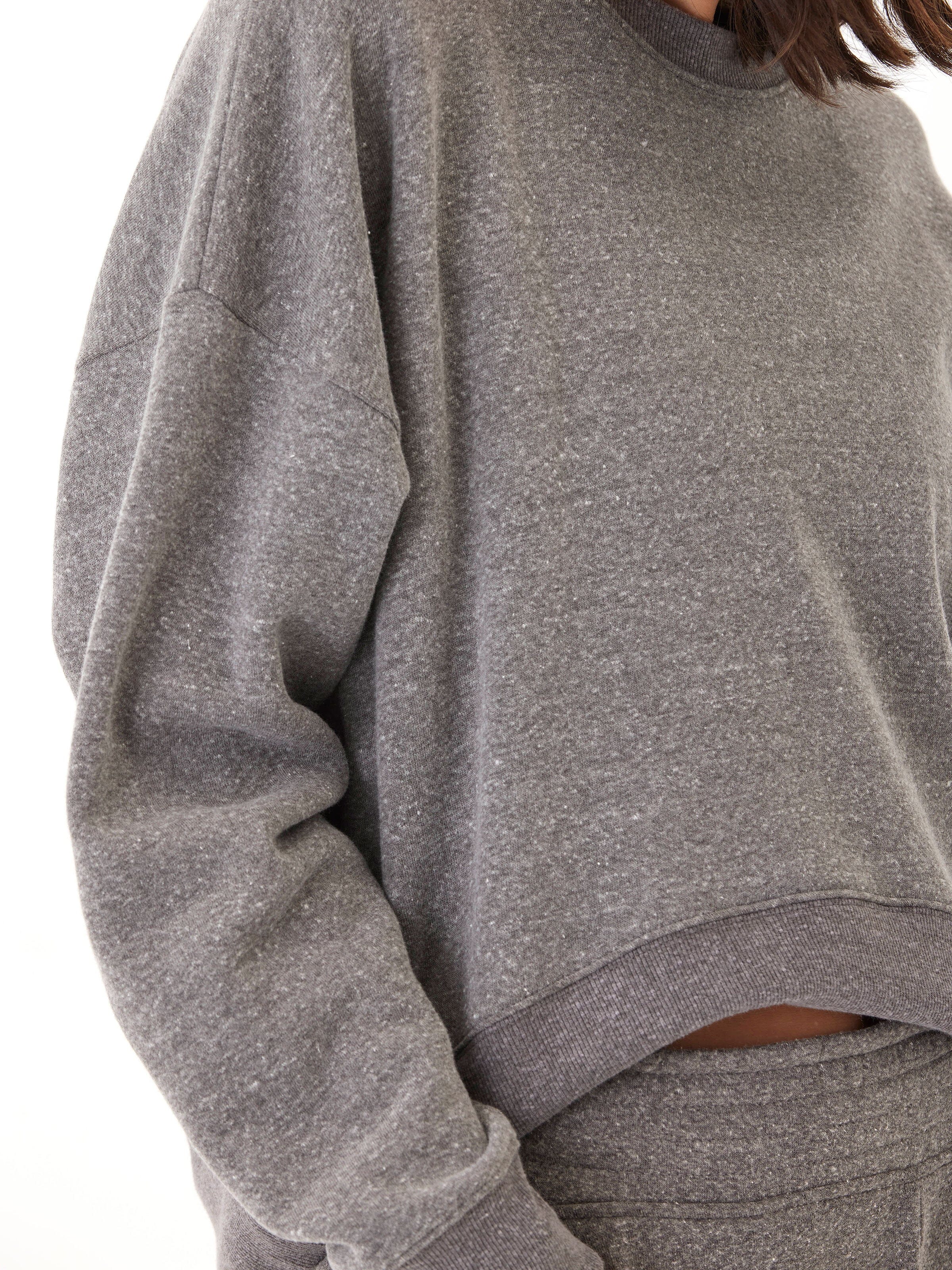 Women's oversized grey triblend fleece pullover with classic rib trim