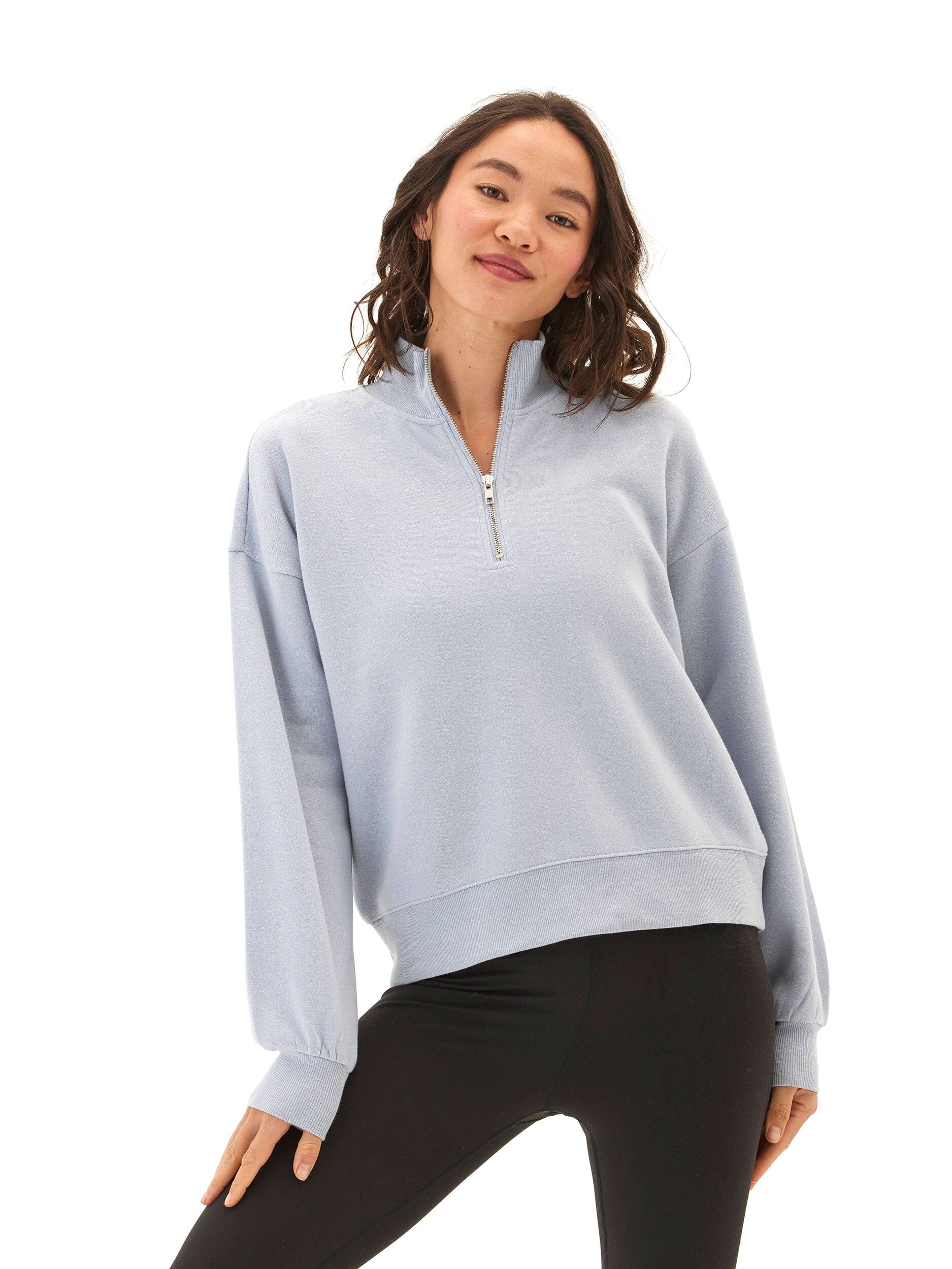 Women wearing light blue Constance triblend fleece half zip pullover with sporty loungewear aesthetic