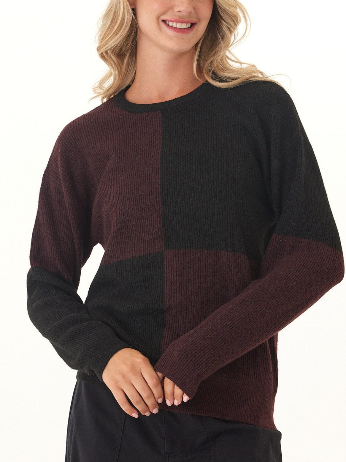 Women's Beryl colorblock sweater in black and burgundy with ribbed trim.