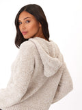 Close up of the Tanisha Boucle Henley Hoodie in cream showing the knit texture and button details.