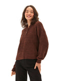 Close-up of the Tanisha Boucle Henley Hoodie featuring soft textured fabric and button accents.