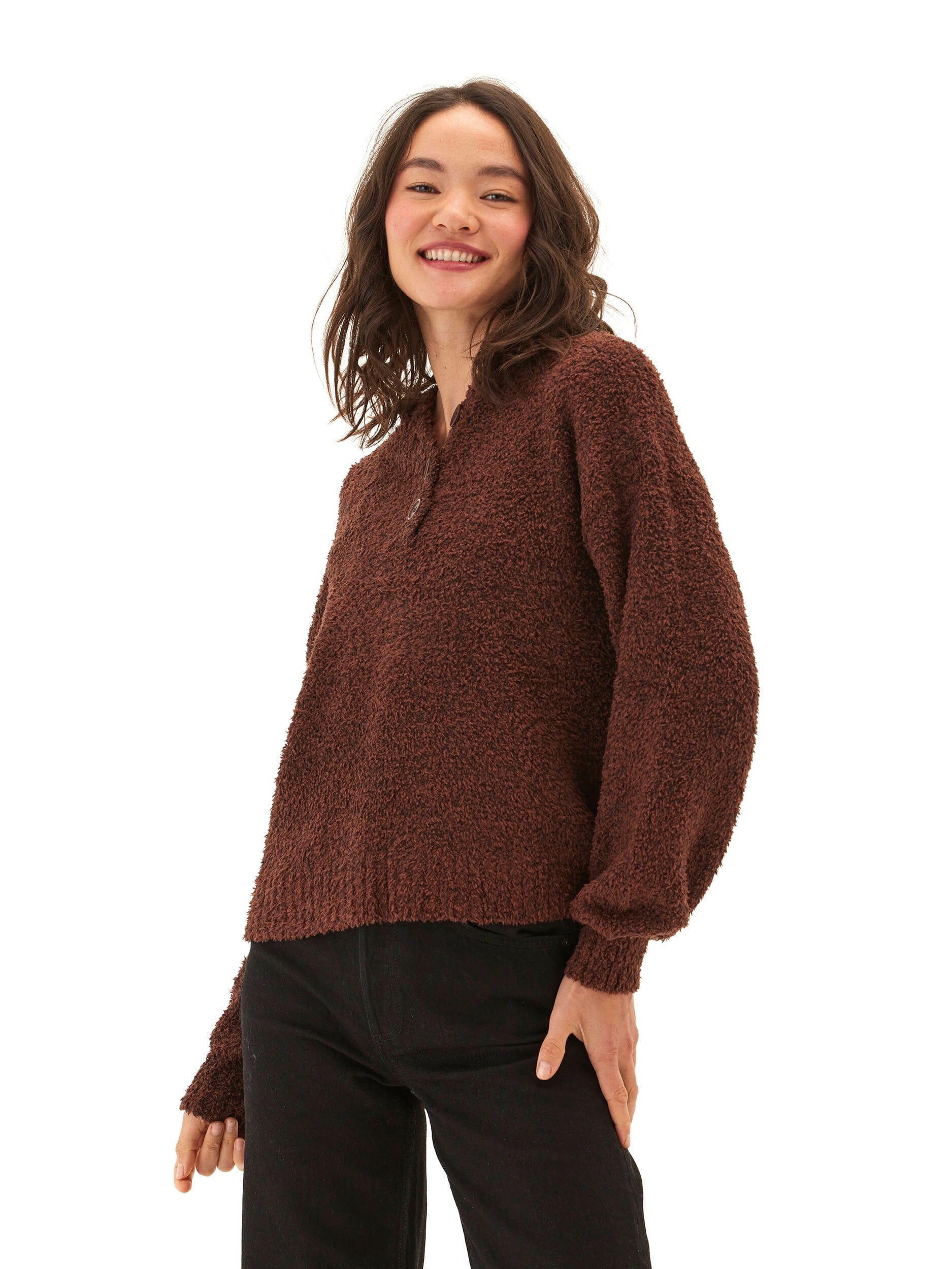 Close-up of the Tanisha Boucle Henley Hoodie featuring soft textured fabric and button accents.