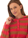 Women wearing the Tanisha Boucle Henley Hoodie in striped knit fabric with button details.
