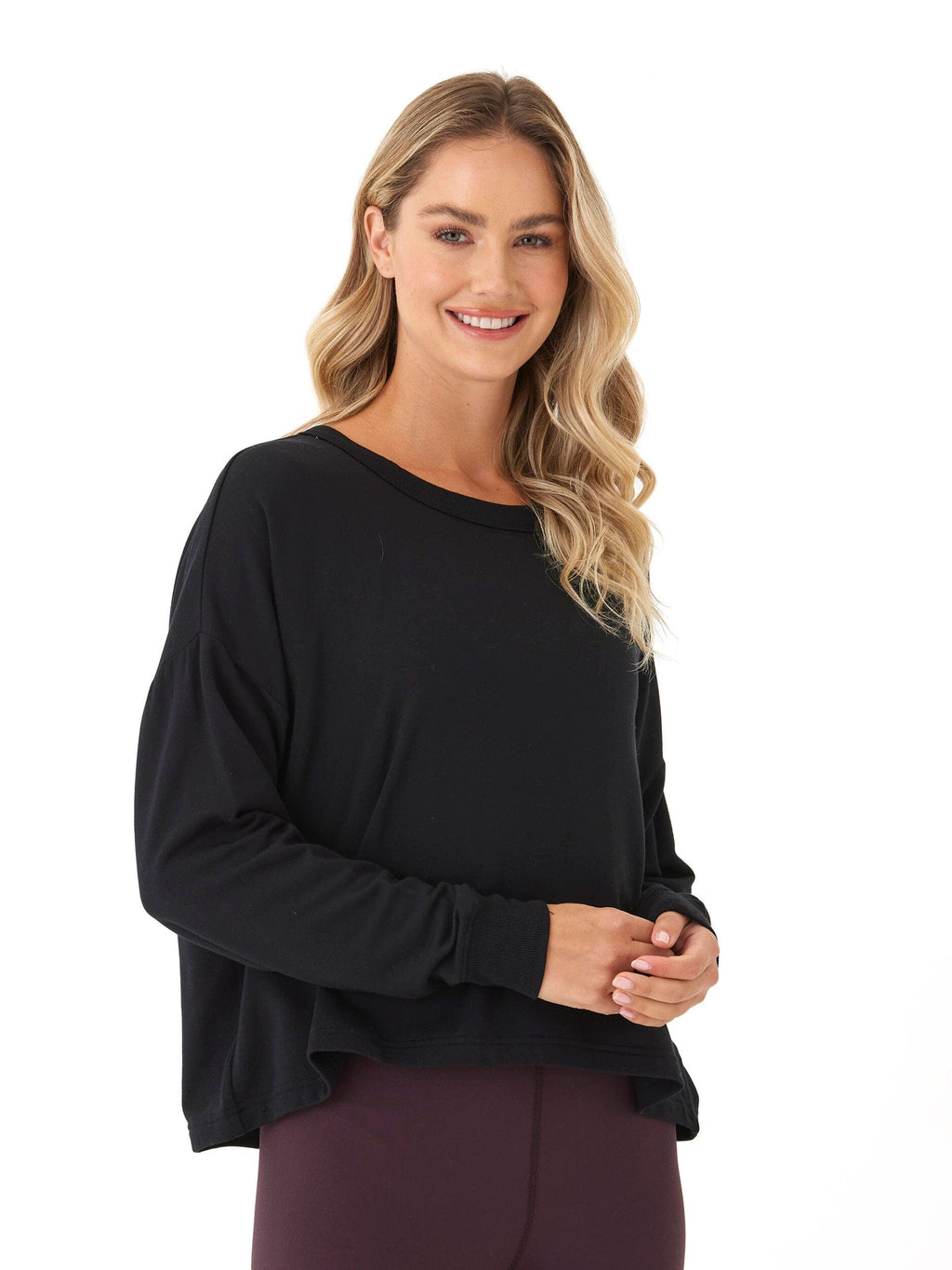 Back view of Raylin Feather Fleece top showing elegant open back detail