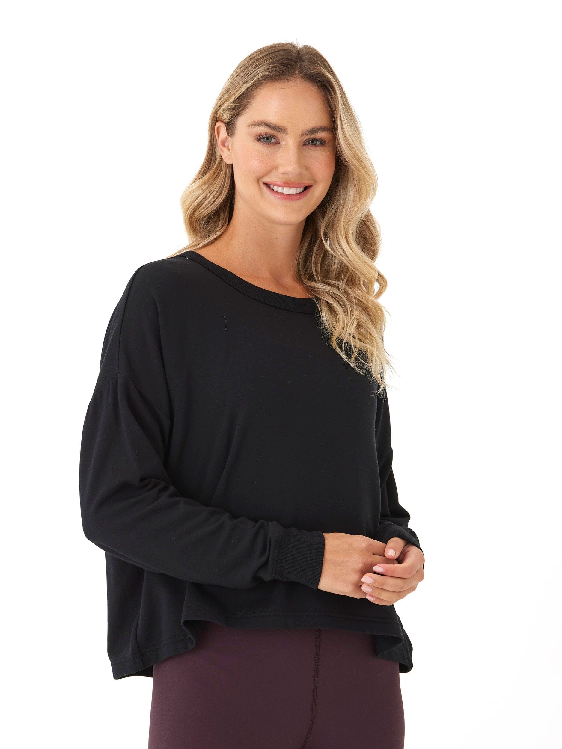 Back view of Raylin Feather Fleece top showing elegant open back detail