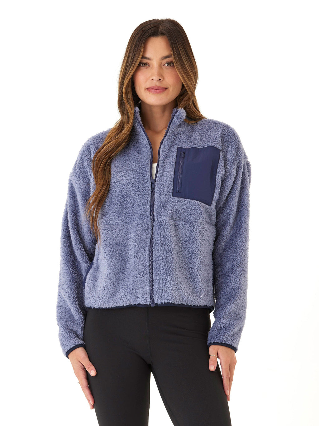 Women wearing Millee Sherpa Full-Zip Contrast Jacket in periwinkle blue with navy accents