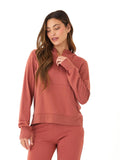 Women's Natia Feather Fleece 1/4-Zip Hoodie in rust featuring a front pocket and thumbhole sleeves.