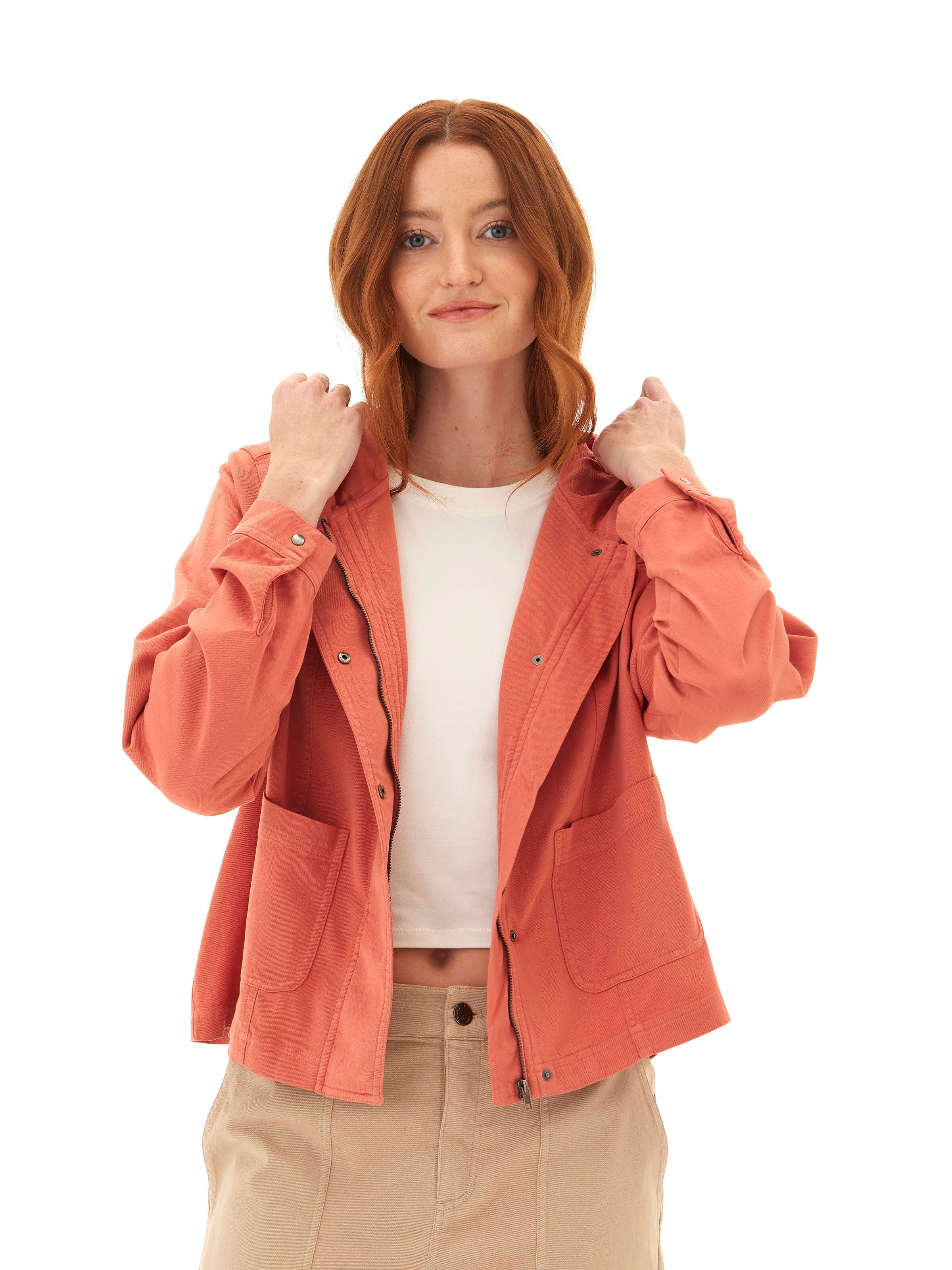 Model wearing a structured stretch twill utility jacket with an integrated hood in a modern slim fit.