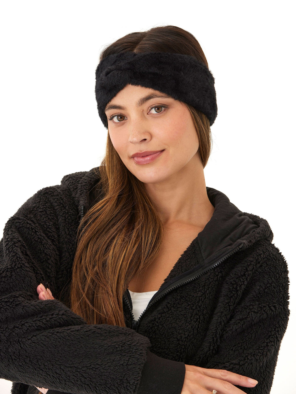 Fuzzy knit headband with a twist detail in a soft, cozy texture.
