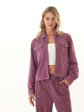 A relaxed fit, long-sleeve mineral wash plum knit jacket with a collared neckline and button-down closure.