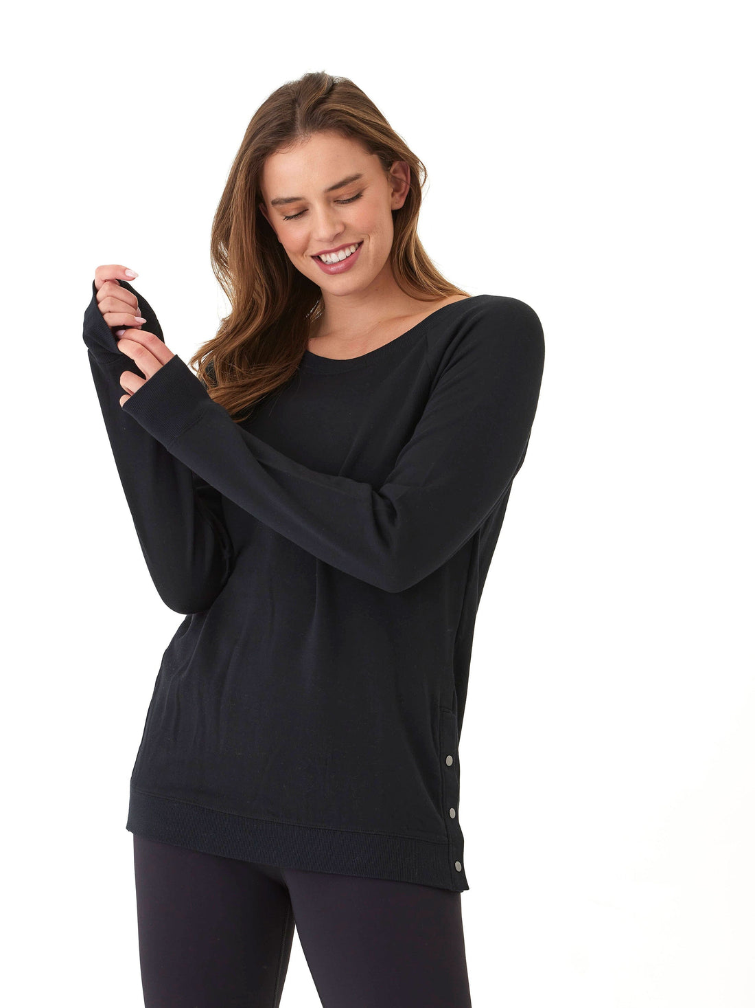 Black Roberta Feather Fleece Snap Button Sweatshirt with a soft, drapey knit texture.