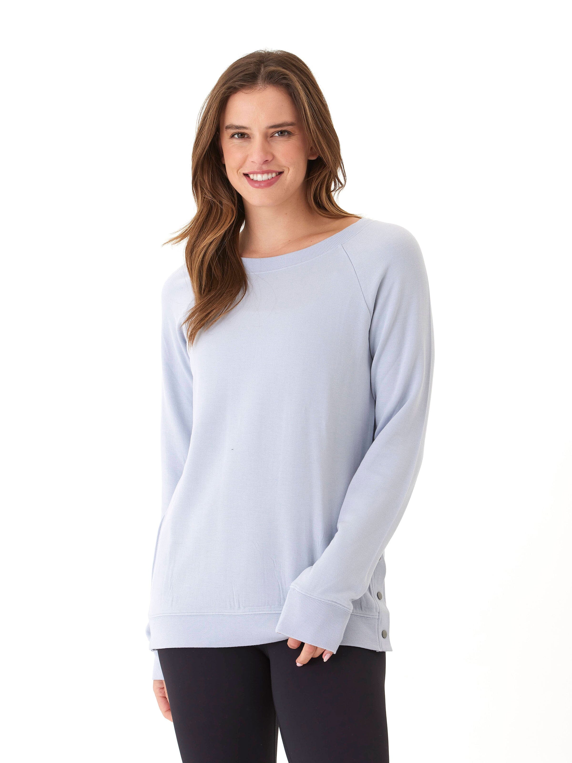 Light blue Feather Fleece snap button tunic sweatshirt with a relaxed fit.