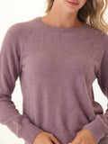 Soft fuzzy knit raglan sweater in dusty-purple, showcasing a relaxed fit and plush texture.