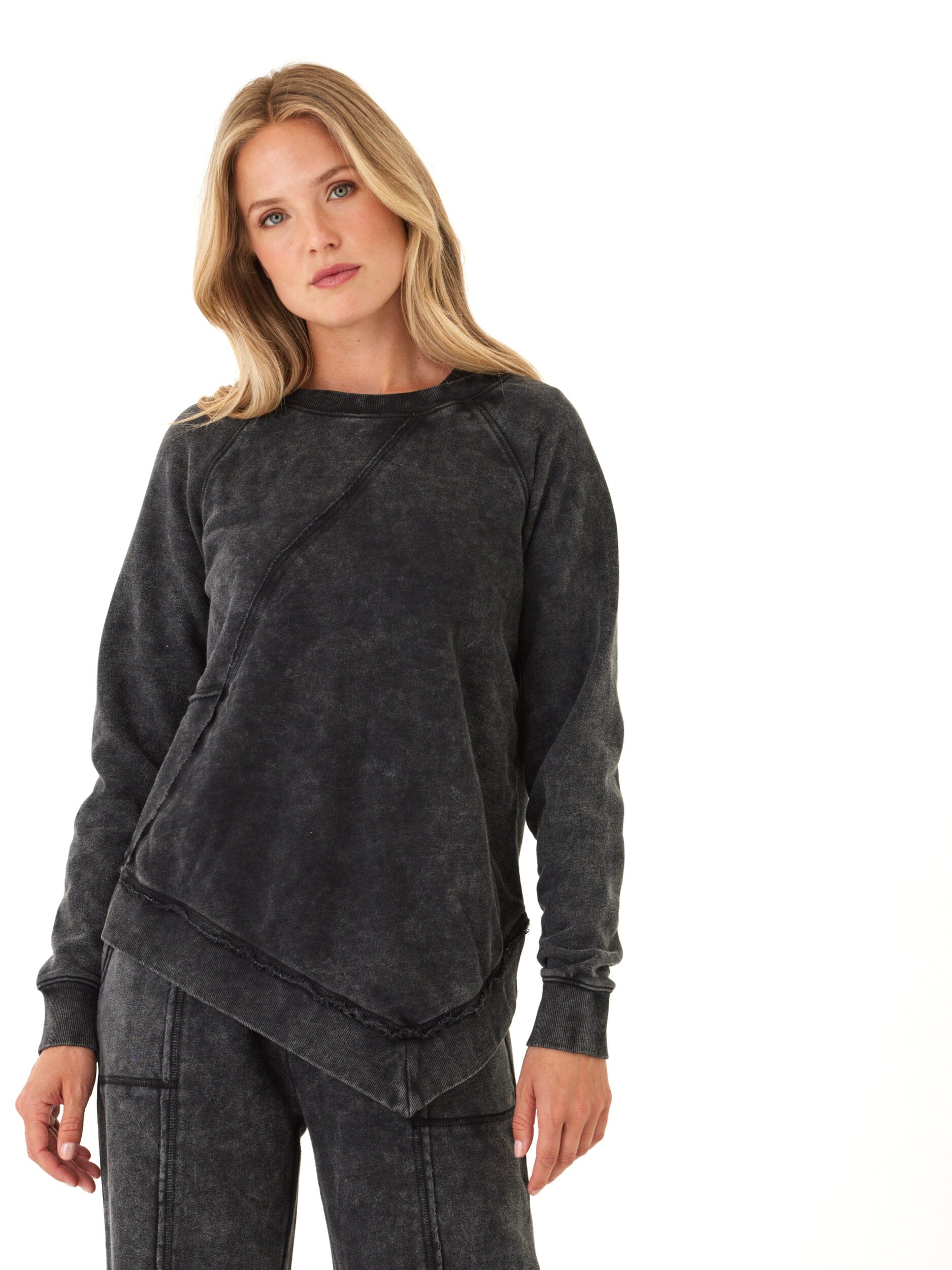 Women's charcoal mineral wash asymmetrical terry pullover with raglan sleeves.