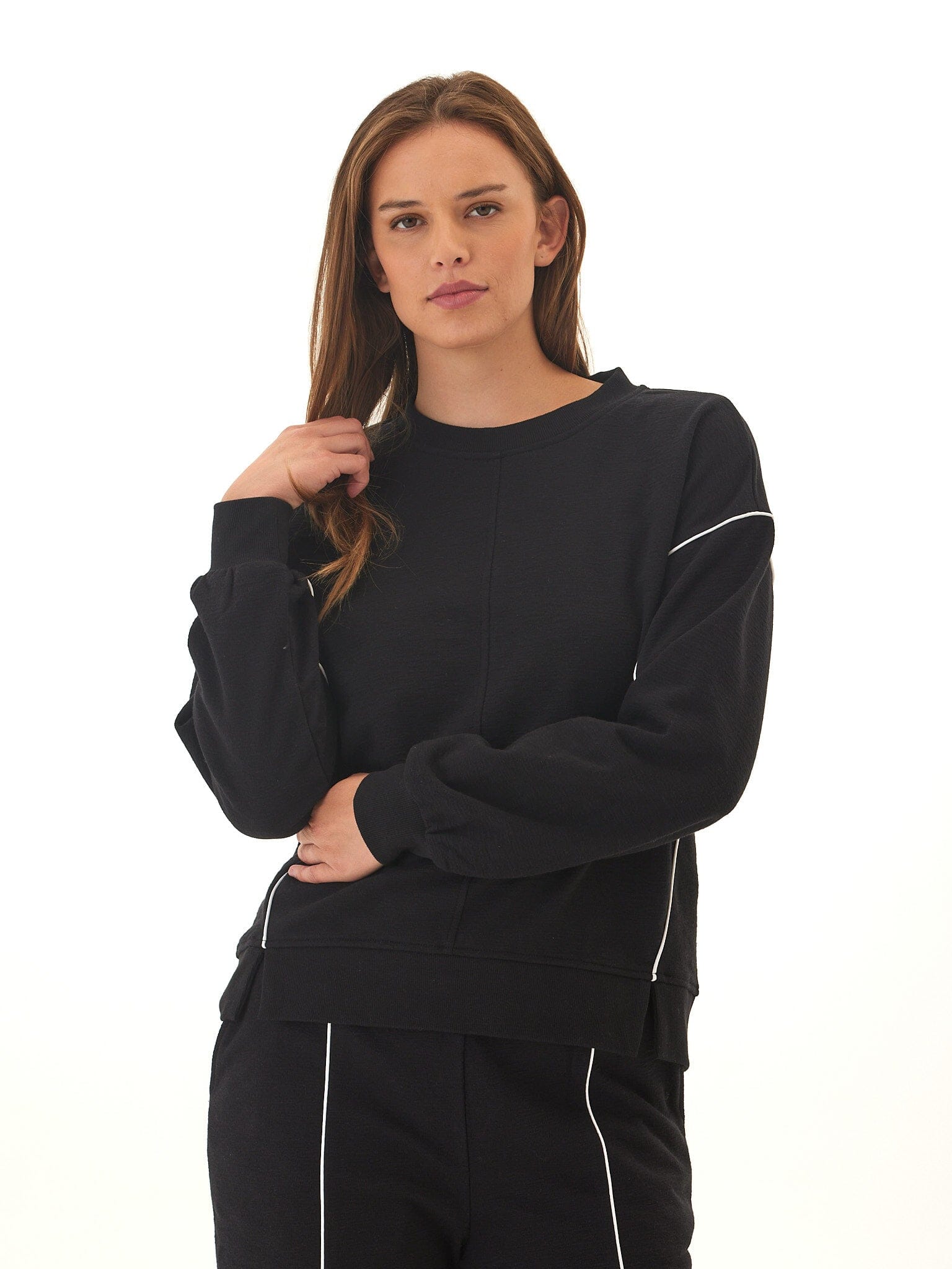Kiesha Slub Terry Pullover in solid black and white with contrast piping detail.