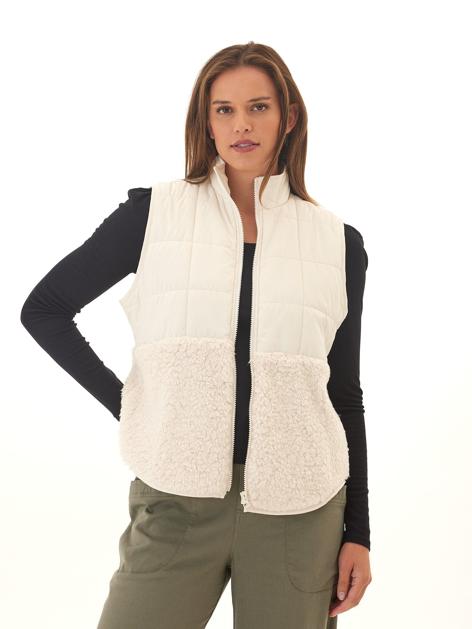 Janey Puffer Sherpa Mix Vest in a quilted design with a high stand collar and plush sherpa trim.