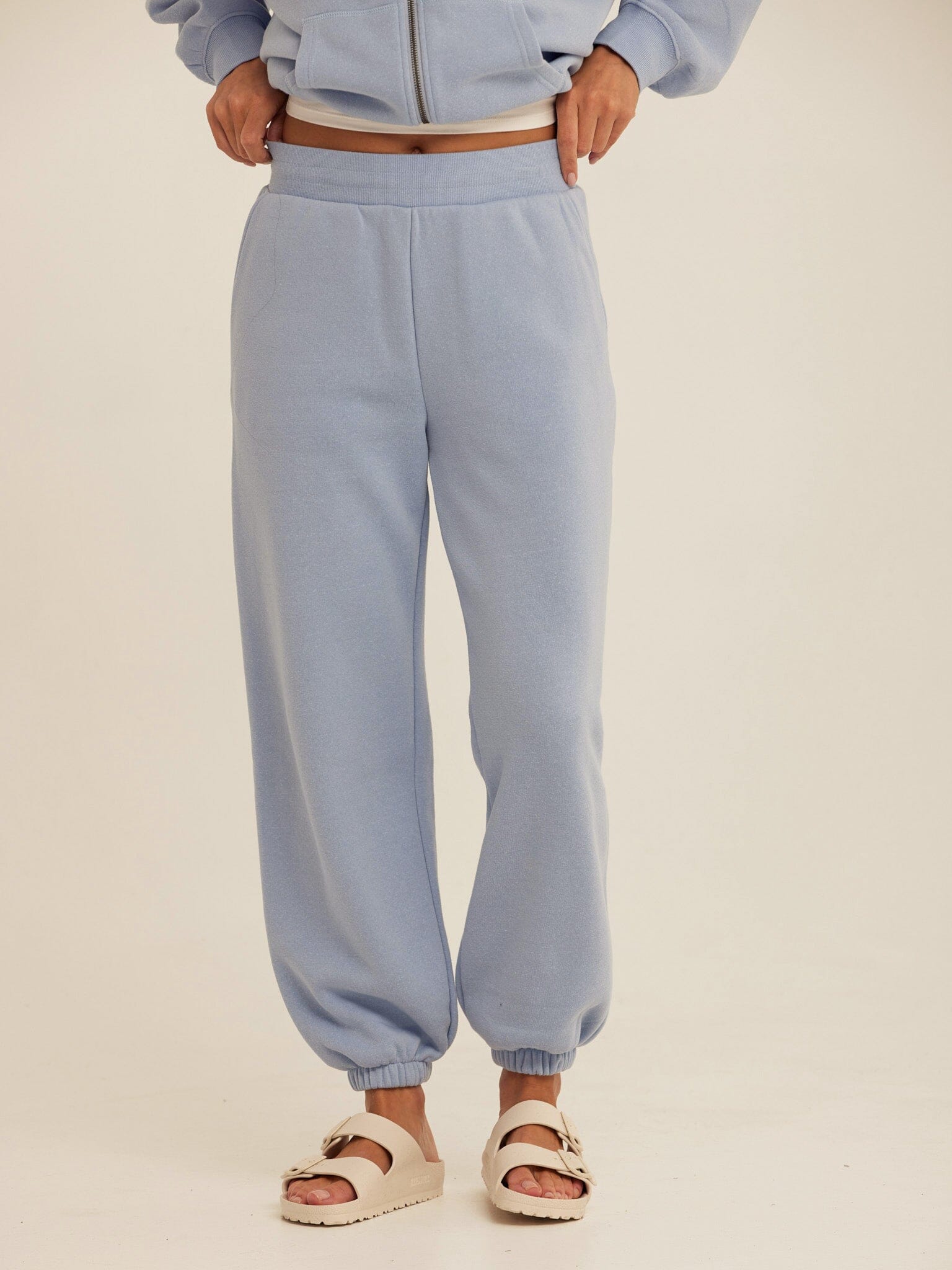 Side view of Threads 4 Thought Core Triblend Fleece Joggers showing the relaxed fit and premium fleece fabric texture.