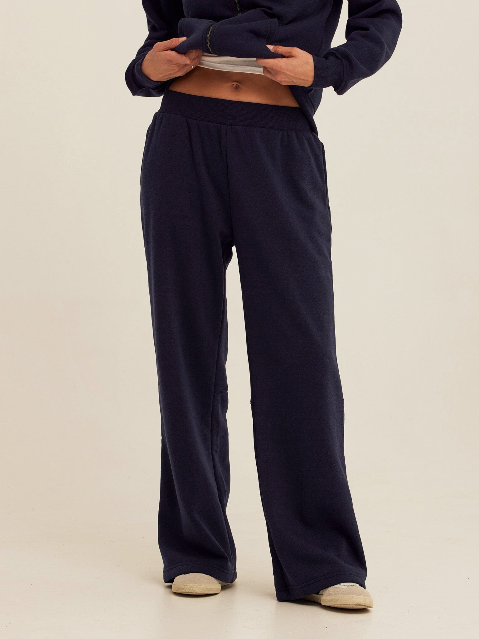 Khrissa Triblend Fleece flare leg pants featuring a smooth pull-on waistband and seam detailing.