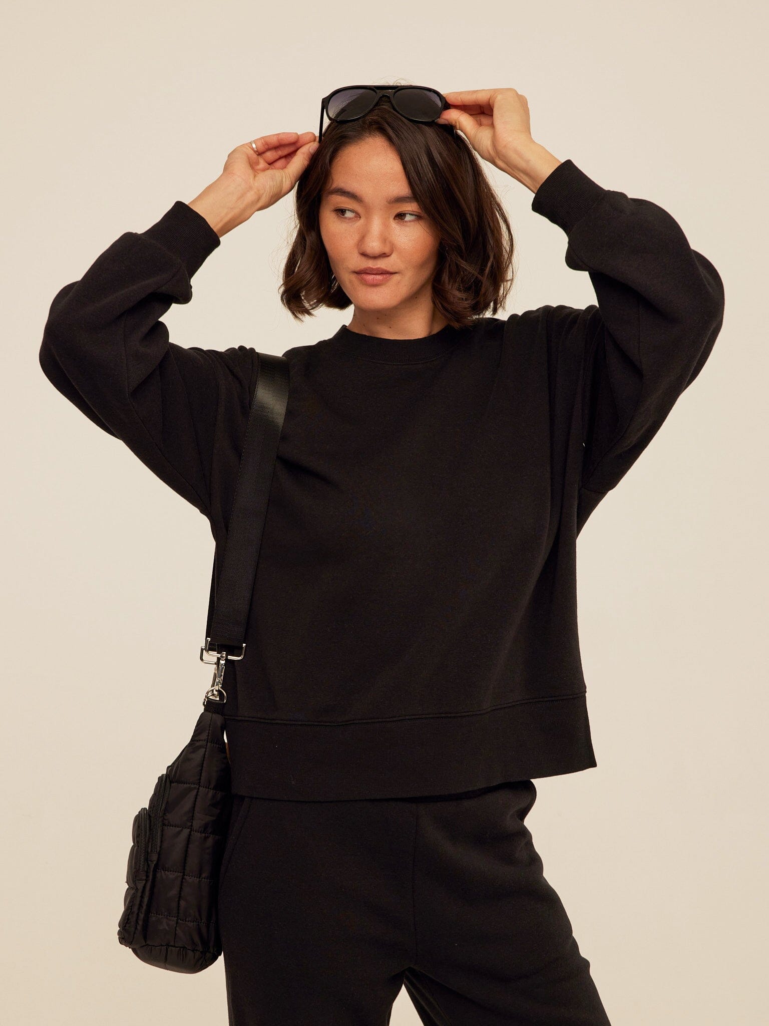Women's black solid color relaxed fit Triblend Fleece sweatshirt