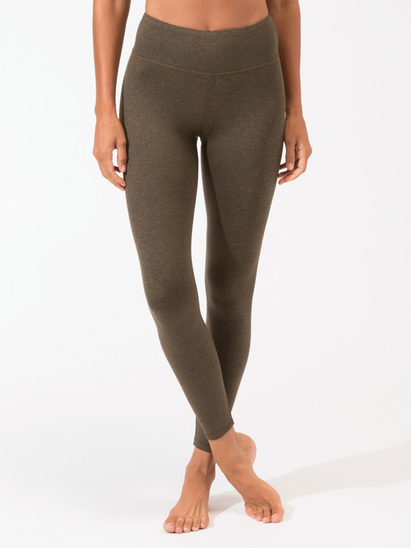 Full length olive green leggings featuring a high-rise waistband and minimalist aesthetic.