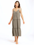 Gina Gauze Ruffle Tiered Dress made of 100% organic cotton with a flowy, tiered design.
