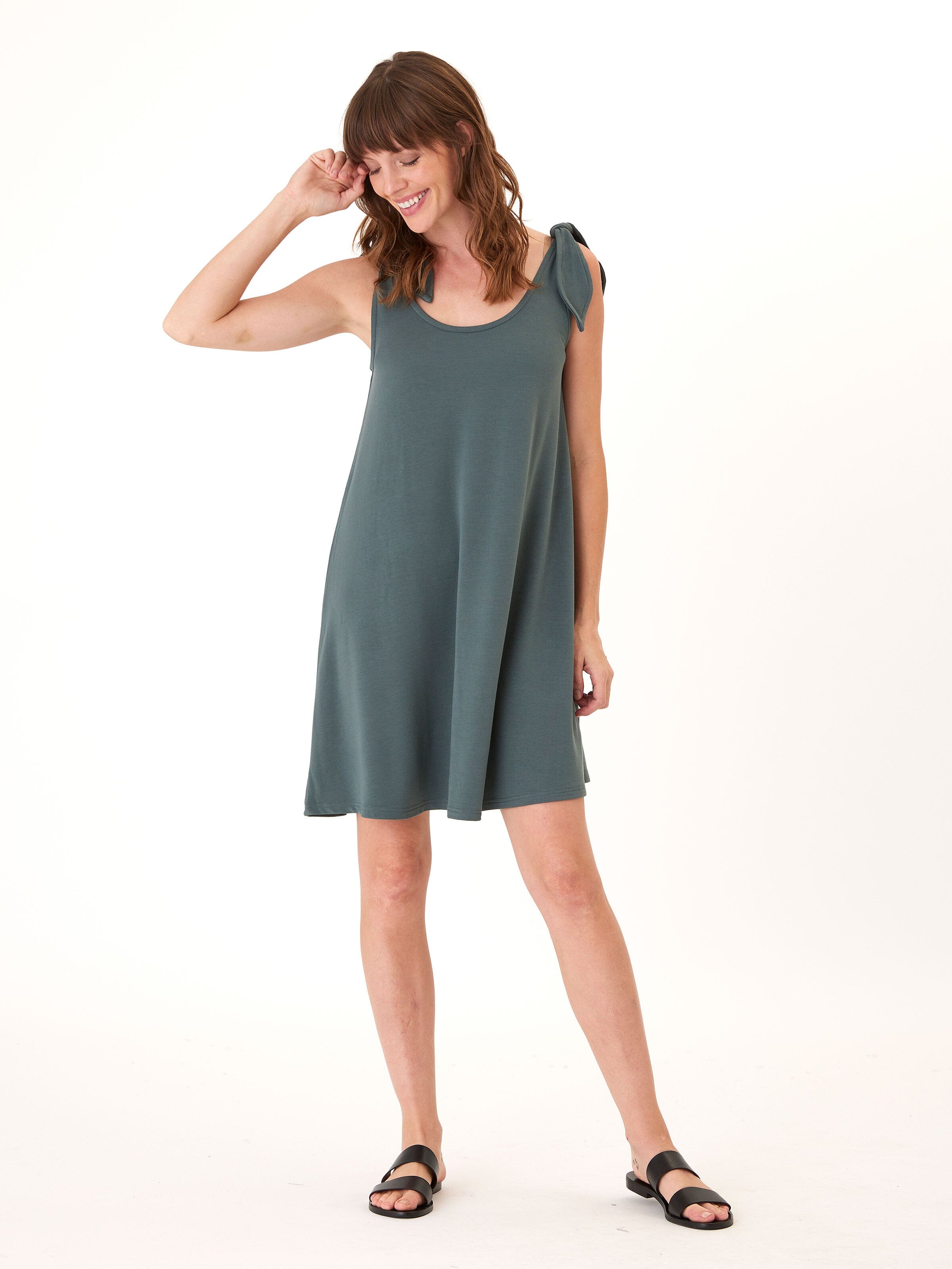 Close up of the Nuri Modal Terry Dress featuring elegant tie shoulder details and soft, flowy fabric.