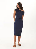 Model wearing a navy blue luxe jersey midi dress with side ruching and cap sleeves, minimalist contemporary style