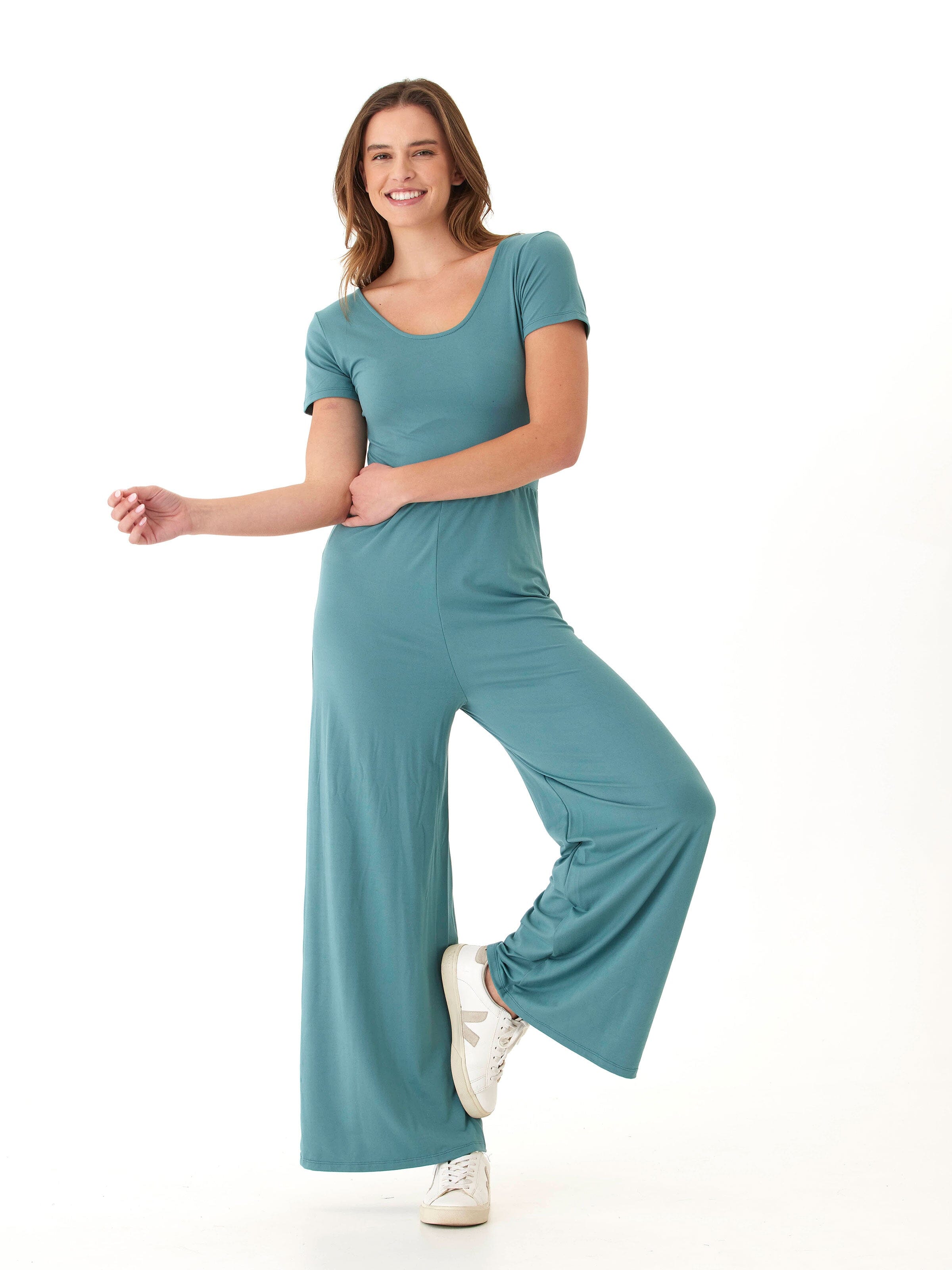 Cori Luxe Jersey Short Sleeve Jumpsuit in solid muted teal with scoop neck and wide-leg silhouette.