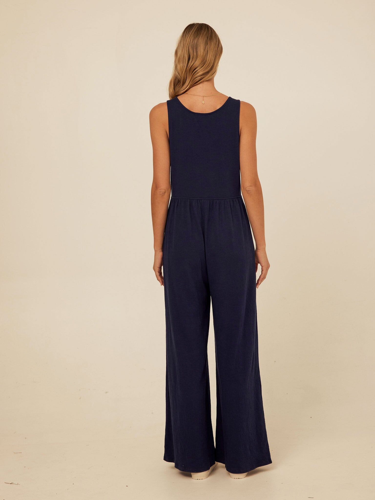 Eira Smocked Jersey Jumpsuit in Navy Blue Wide-Leg Minimalist