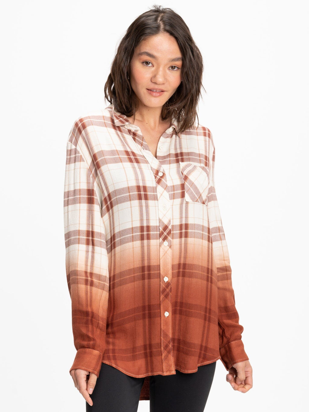 Oversized Marlow woven button-up plaid shirt in rust and brown displayed on a hanger.