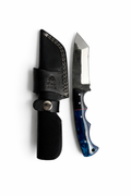 Hand-forged carbon steel utility knife with a hammered blade and blue resin handle