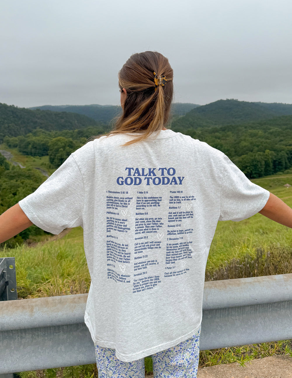 Casual unisex graphic t-shirt with Talk to God text in grey and blue options.