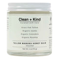 Close up of a glass jar of Whipped Tallow Manuka Honey Balm held in a hand