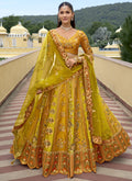 Multicolor silk bridal lehenga with embroidered blouse and lacework dupatta