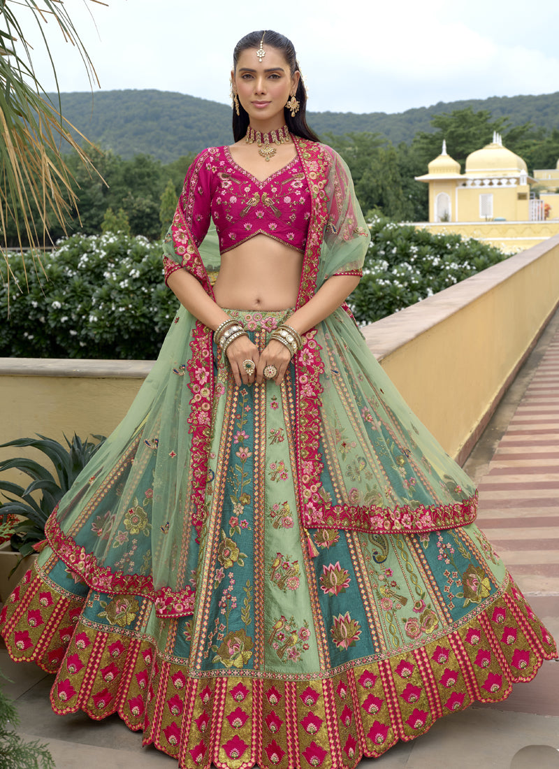 Multicolor silk bridal lehenga with embroidered blouse and lacework dupatta