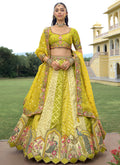 Multicolor silk wedding lehenga choli set with Badla embroidery and lacework dupatta.